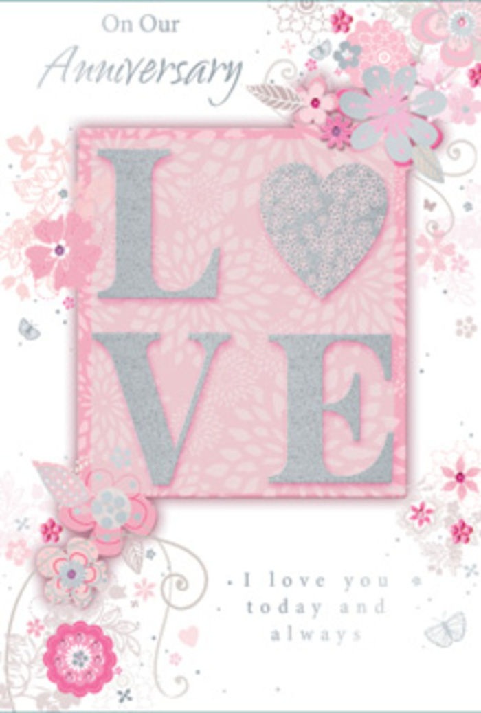 This photograph shows a romantic anniversary card that feels as welcoming as stepping into a sunlit South Woodford sitting room where love is woven into everyday life. The design centres on the word LOVE, printed in bold capital letters that rise from the surface in a textured, frosted glitter finish. The glitter is delicate, not overpowering, with tones of pearlescent white and soft silver that glimmer subtly, much like sunlight glancing off leaves in nearby Wanstead Park. Surrounding the word are wispy, hand-drawn flowers and feathery sprays of foliage that frame the central motif without crowding it. These blooms are rendered in a dreamy mix of blush pink, muted lilac, gentle ivory, and whisper-soft grey, their thin lines and shaded petals suggesting the careful, artistic touch of a florist planning a hand-tied bouquet for an anniversary delivery near George Lane. Fine flourishes meander through the design: filigree lines curl into delicate loops, tiny leaves sprout along slender stems, and almost-hidden butterflies hover at the edges, their wings hinted at with just a suggestion of pale colour and shimmer. The background stays a velvety, soft pink, giving the impression of warmth and tranquillity, like afternoon light filtering through sheer curtains. Just below or beside the main motif, the words I love you today and always appear in an understated, graceful script, the letters lightly slanted, as if written by hand in a cherished card exchanged year after year. Taken together, the tactile glitter, airy florals, and heartfelt message make this card feel like a bouquet captured on paper-a quiet, enduring tribute perfectly suited to marking an anniversary in South Woodford.