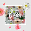 A serene, pastel bouquet is captured in a moment of stillness, every bloom carefully placed yet appearing effortlessly natural, like something carried home from a quiet wander through South Woodford's high street on a bright but gentle morning. The composition centres on blush pink roses, their petals arranged in luxurious spirals, each flower with a soft, velvety surface that catches the light. Around them, creamy peach gerberas spread their broad, daisy-like petals, bringing a clean, modern structure that contrasts beautifully with the romantic curves of the roses. Fine clusters of white gypsophila float between the larger flowers like tiny stars scattered across a soft sky, adding a delicate, cloud-like softness that makes the arrangement feel light and airy. White chrysanthemums contribute a calm, steady presence, their many-layered petals forming rounded blooms that suggest resilience and quiet strength. There is just enough fresh foliage to offer hints of cool green, framing the pastels and giving the impression of a bouquet recently trimmed and tied in a local South Woodford shop. The overall mood is one of gentle optimism and ongoing care-something equally suited to celebrating everyday victories, sending comfort during more reflective times, or simply brightening a favourite reading corner. Imagining this as part of a monthly flower subscription, you can almost hear the soft rustle of the wrapping being opened on each delivery, feel the freshness of the stems in your hands, and sense how regularly refreshed flowers could bring a subtle yet constant joy to a home, echoing the calm, neighbourly character of South Woodford itself.